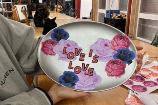 decoupage plate with love is love written on it
